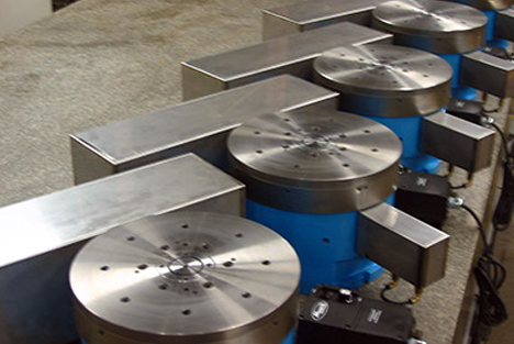 A series of newly manufactured rotary grinding tables